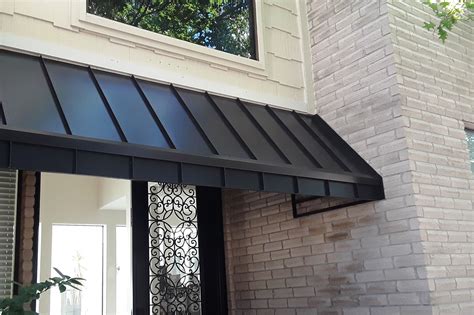 metal roof awning on brick house|brick porch with awning.